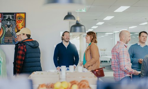 A team gathered around a table