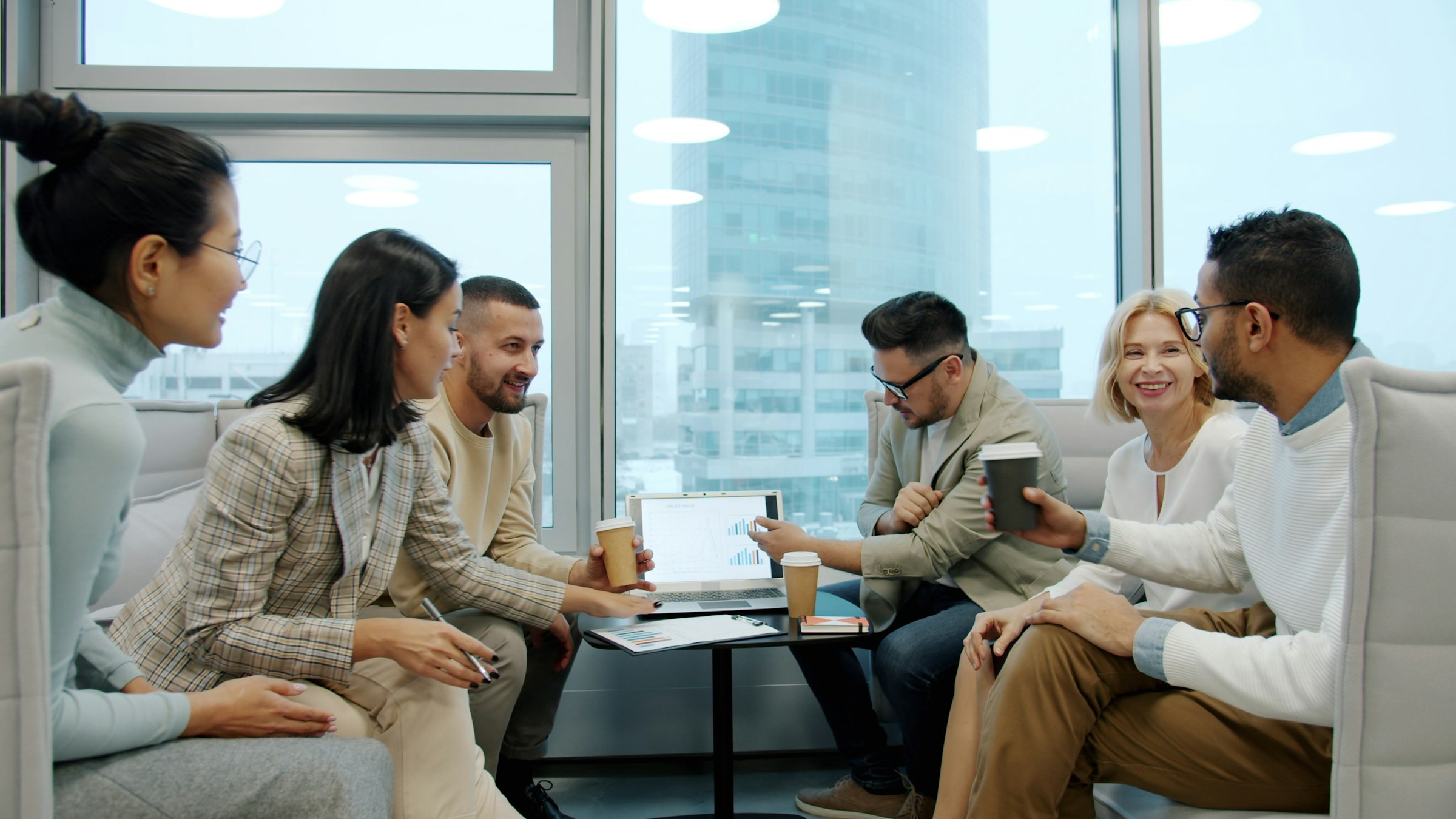 Technical buyers discussing product capabilities in a modern office