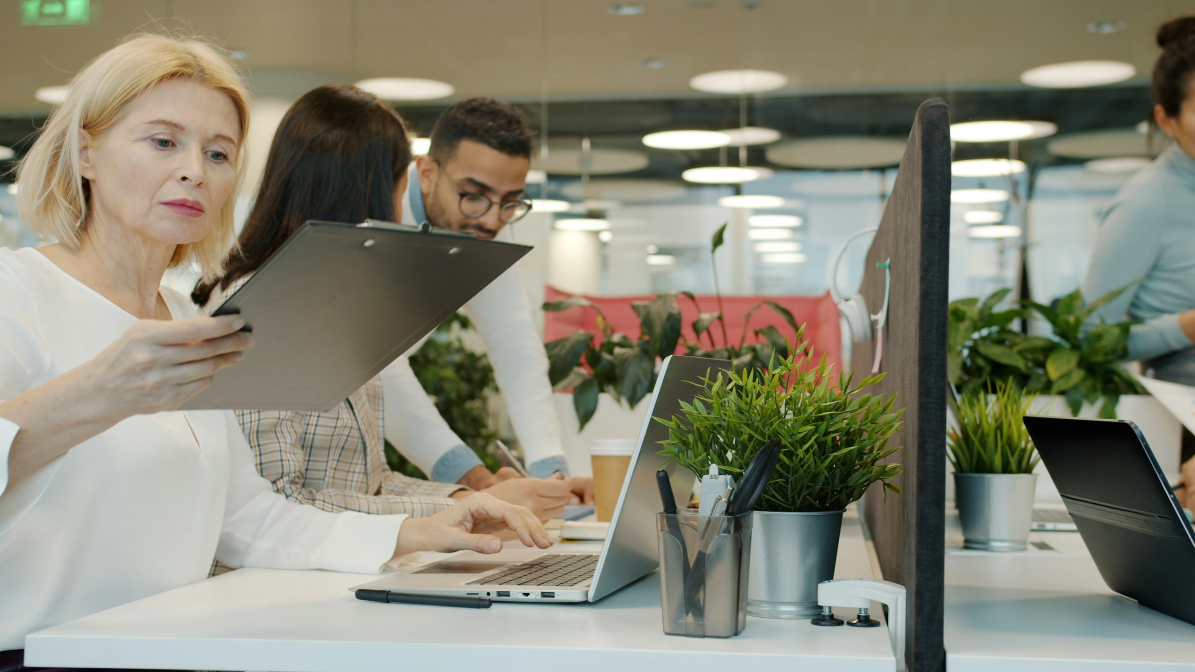 Colleagues collaborating in a modern office